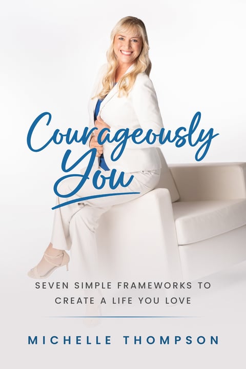 Book cover showing a blonde woman in white blazer sitting on a chair with the title Courageously You by Michelle Thompson